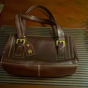 Genuine Etienne Aigner Handbag. 
Height 6.5” x length 11” x Width 3”.